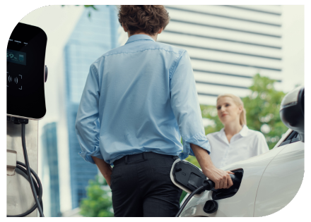 Man charging his EV at work